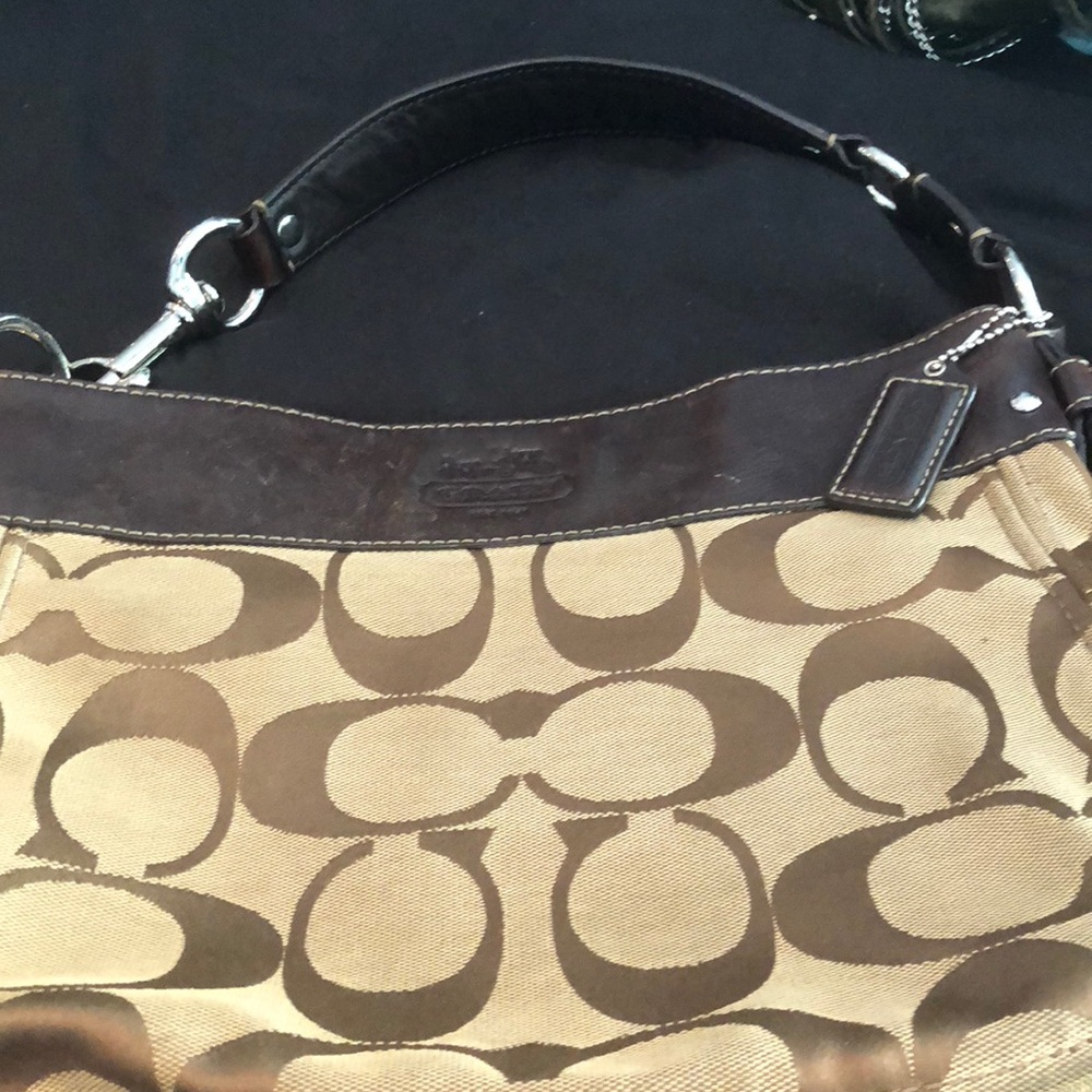 Used but outside looks good! Coach bag